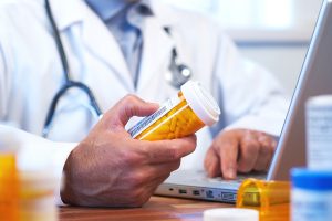 bigstock-Doctor-Preparing-Online-Intern-9351197