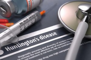 Huntington's disease - Printed Diagnosis on Grey Background.