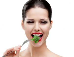 bigstock-Woman-with-red-lipstick-eating-43223464.2
